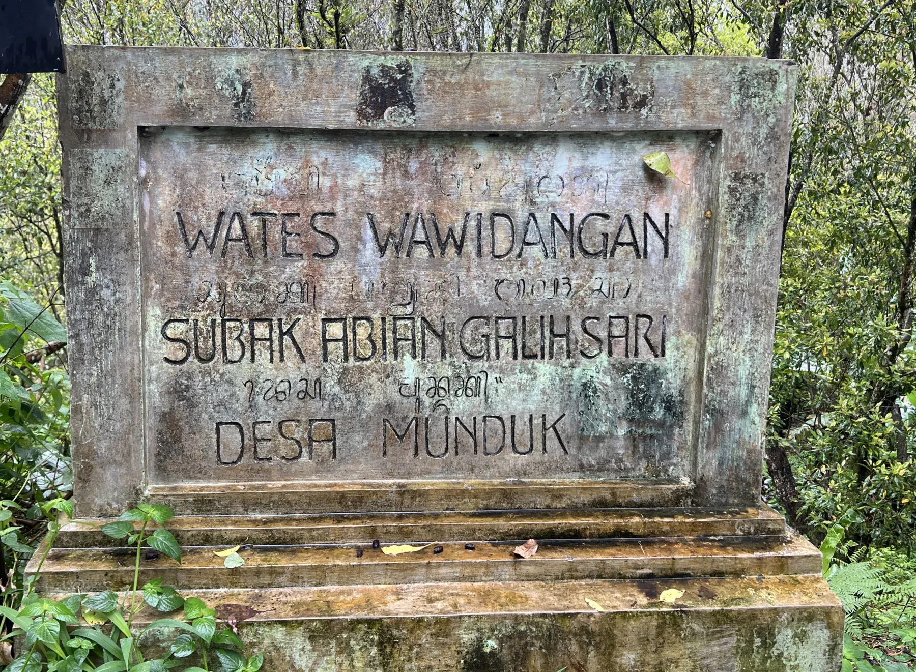 A directional sign in Munduk village, Bali.