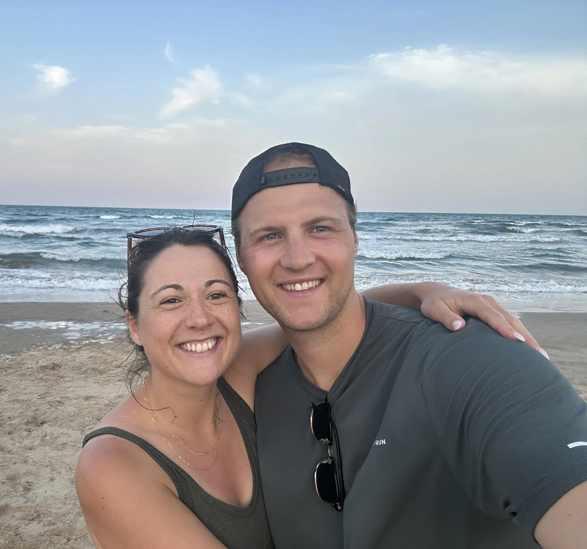 Tom and Julie on a beach by the sea