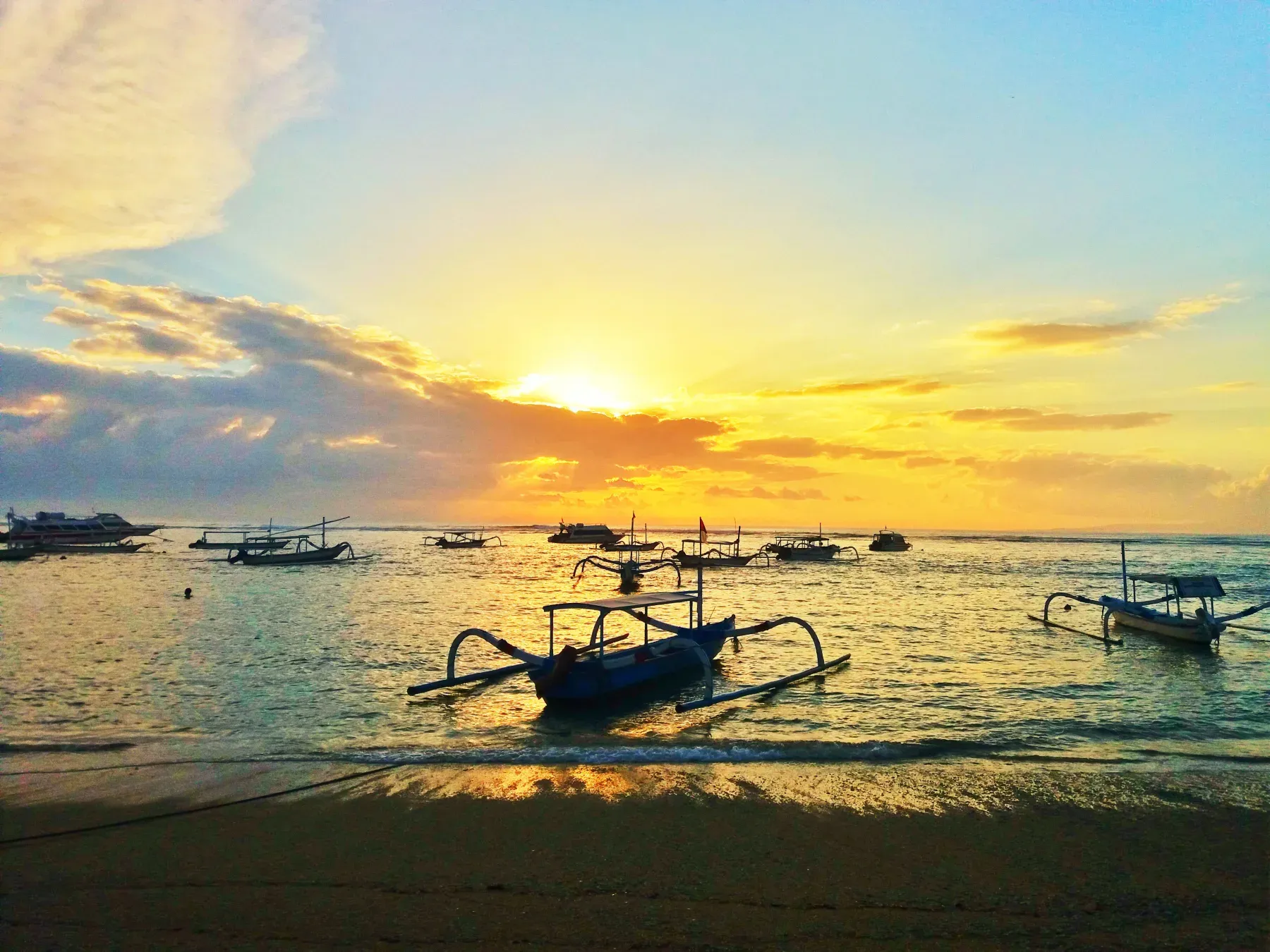 Fishing boats in the morning off Sanur Beach.