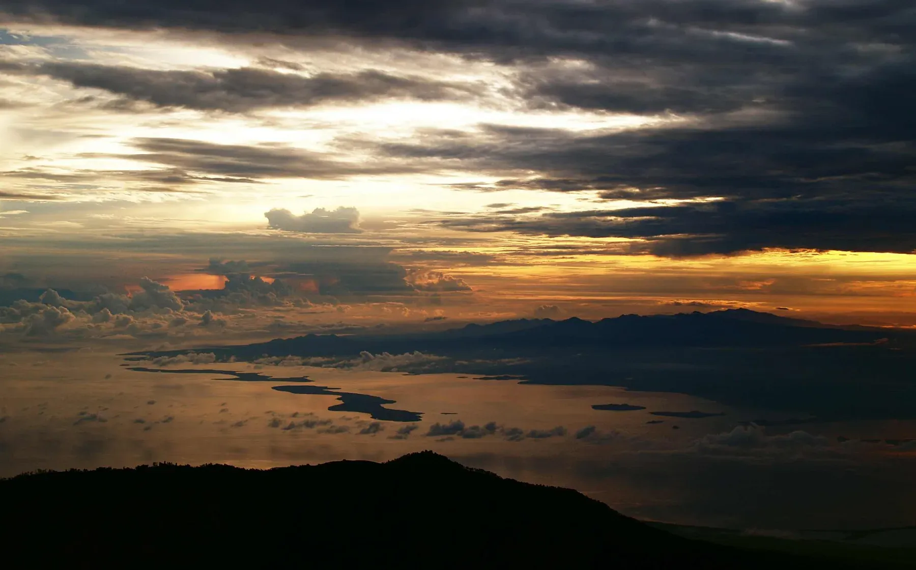 Sunrise over Sumbawa seen from Mount Rinjani in Lombok.