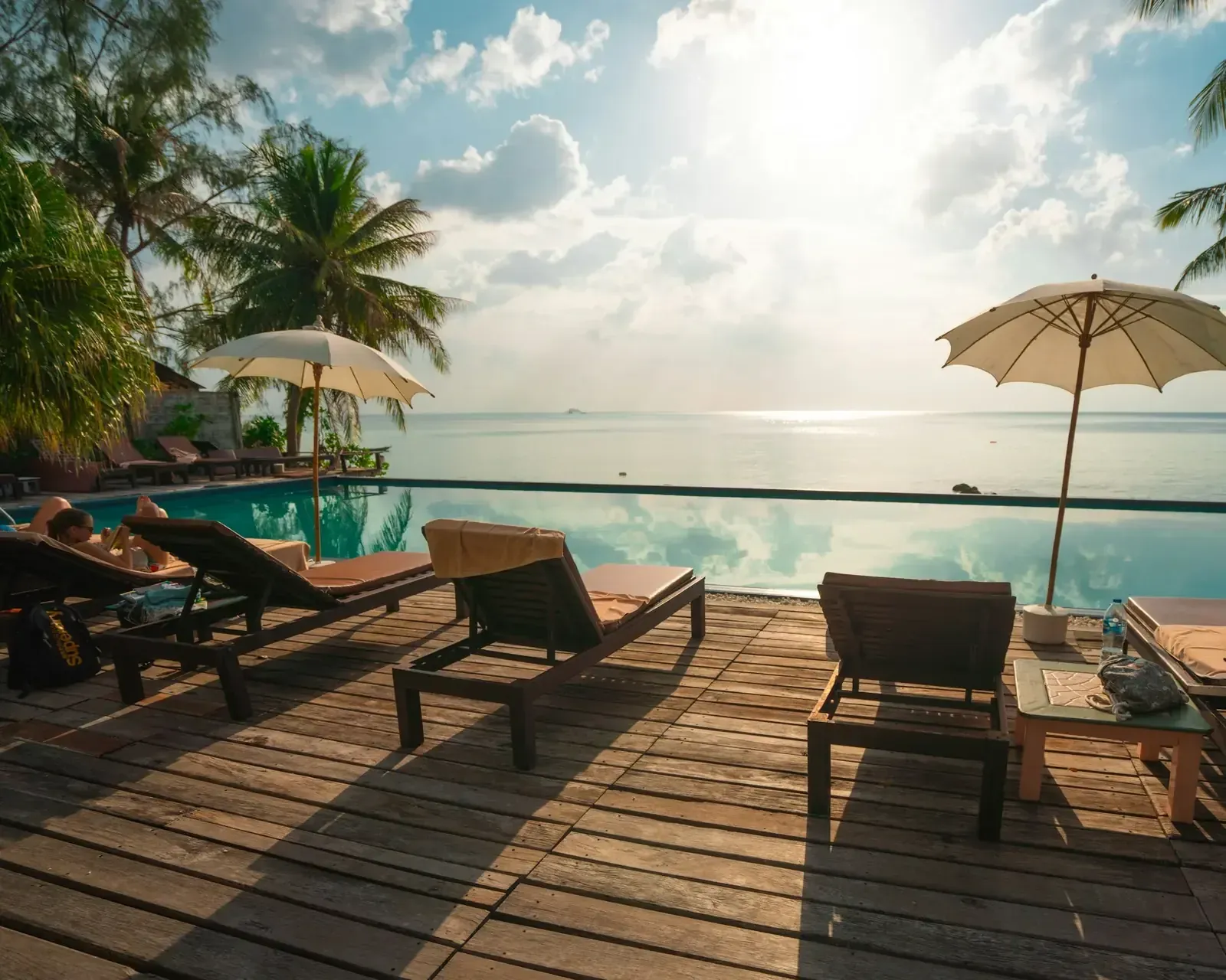 An infinity pool facing the sea in the morning light.